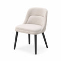 Chaise en tissu bouclé beige avec pieds en métal noirs